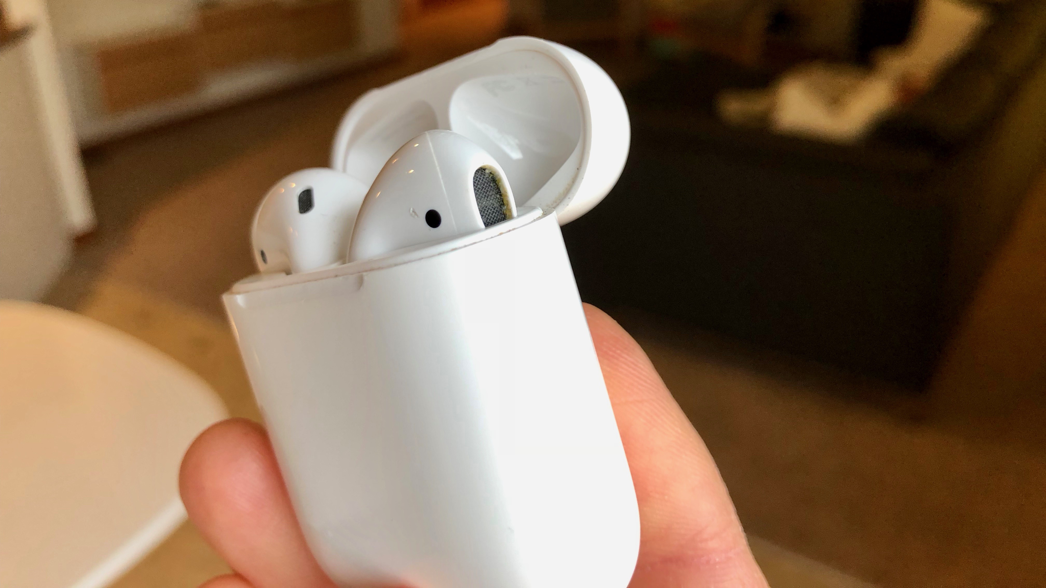 cleaning and inspecting AirPods