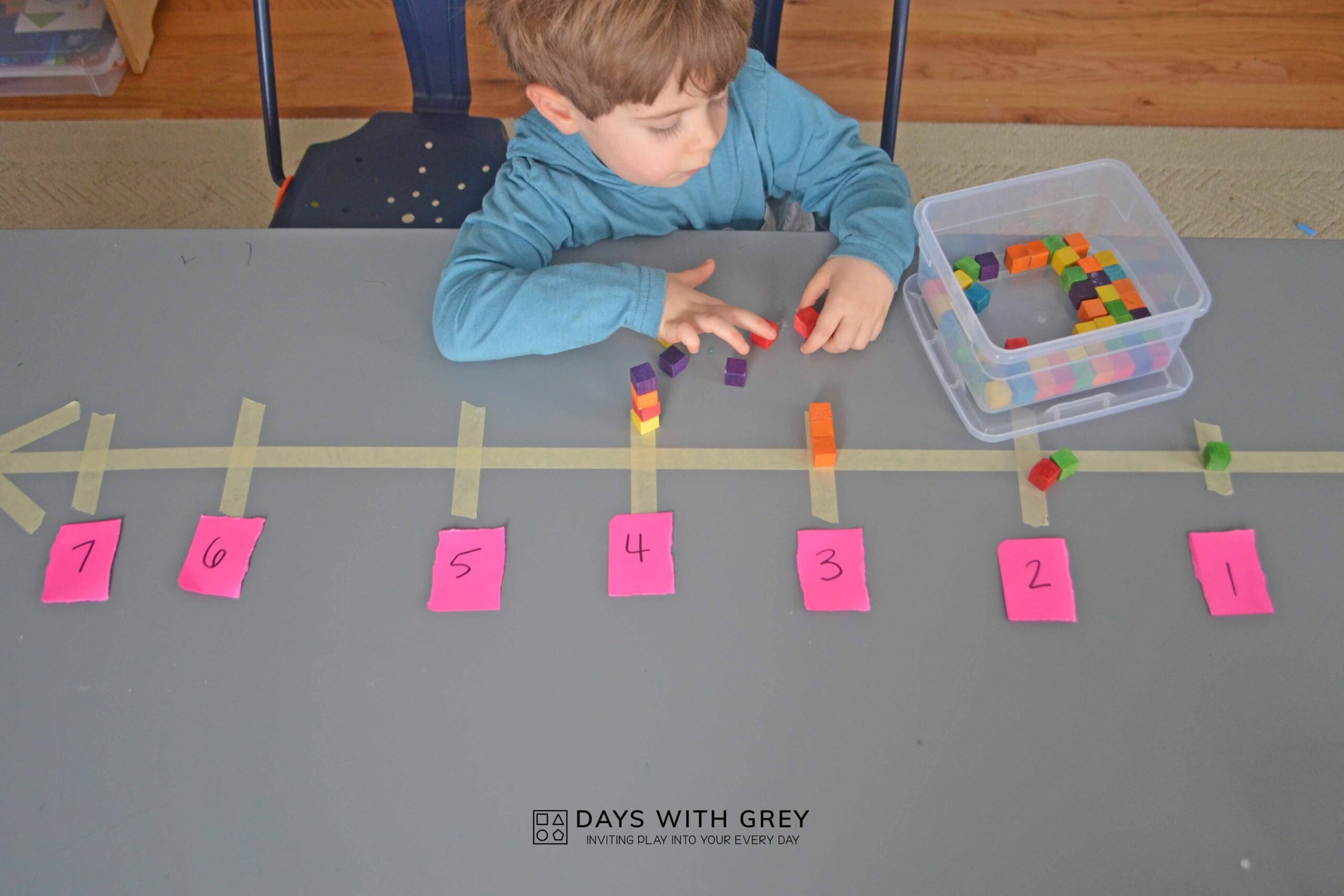 children learning math with blocks and numbers
