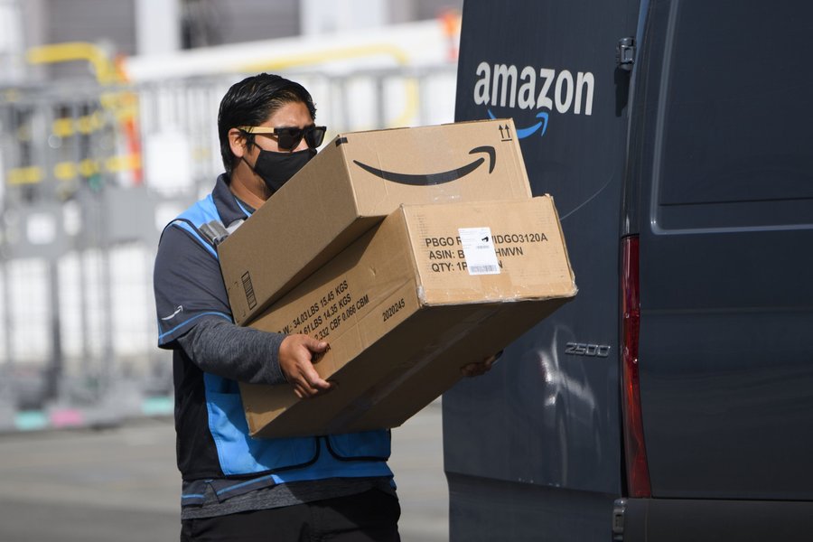 Amazon delivery driver handling packages