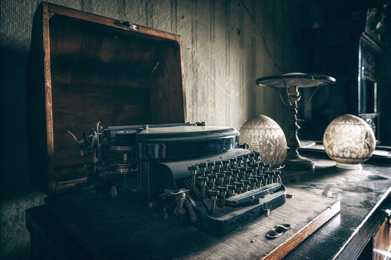 vintage typewriter and old manuscripts