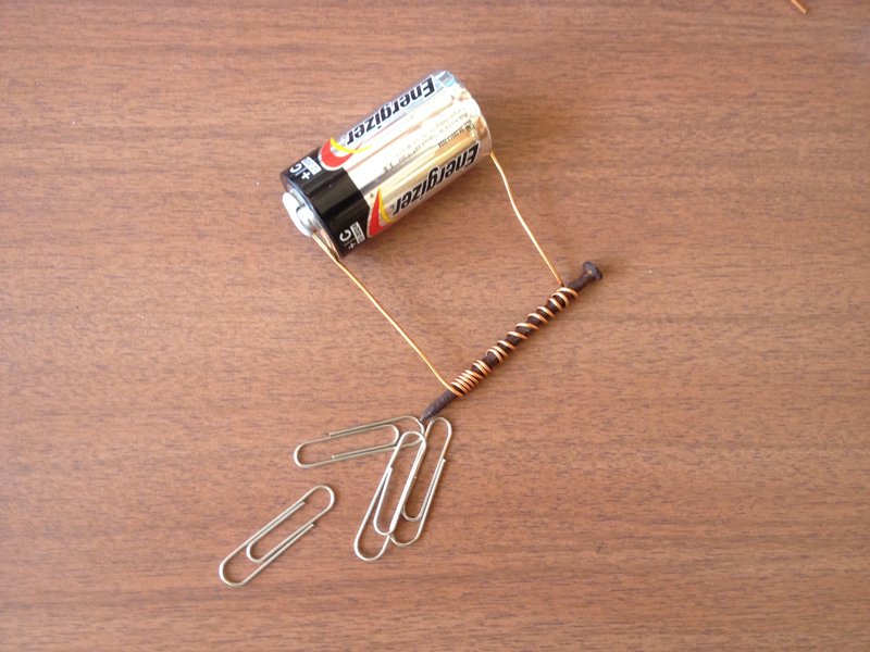 Simple electromagnet made by wrapping wire around a nail