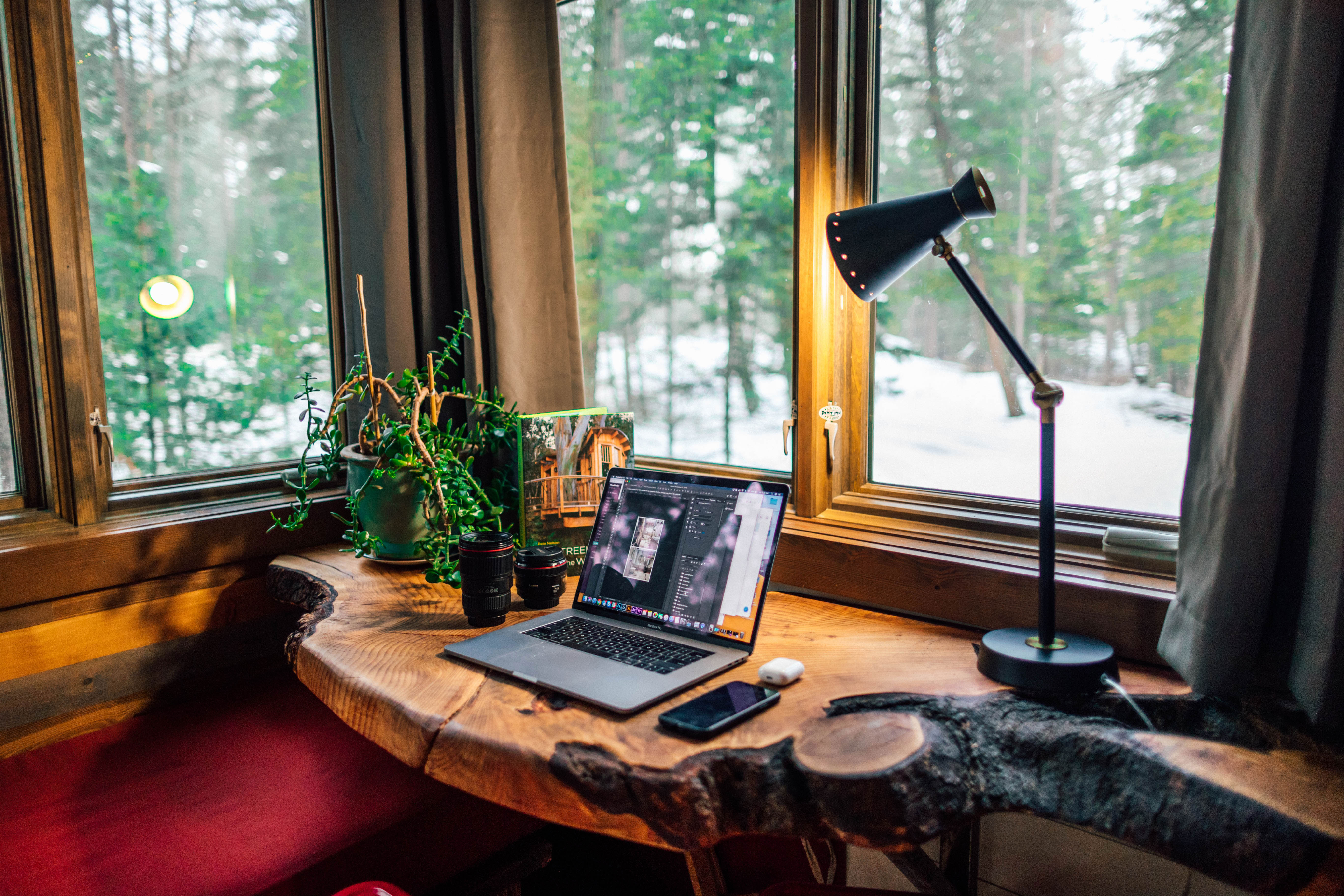 scenic desk working on notebook