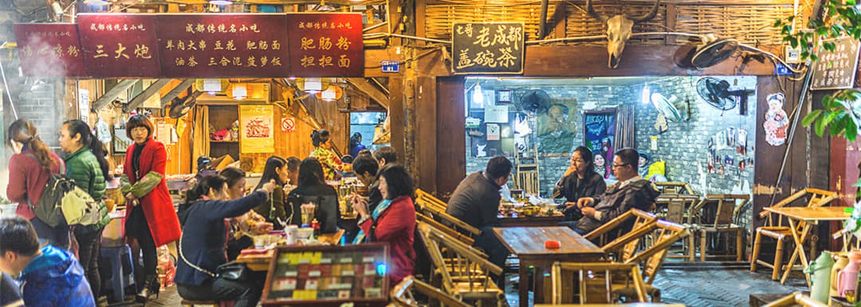 A bustling Chengdu street food market at night