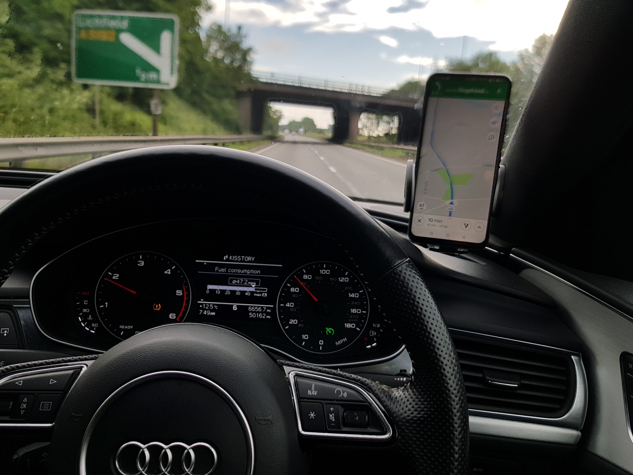 cars speedometer and road