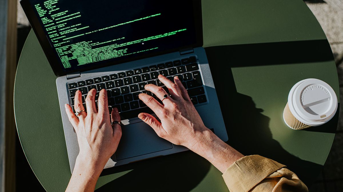 laptop with code on screen and browser automation