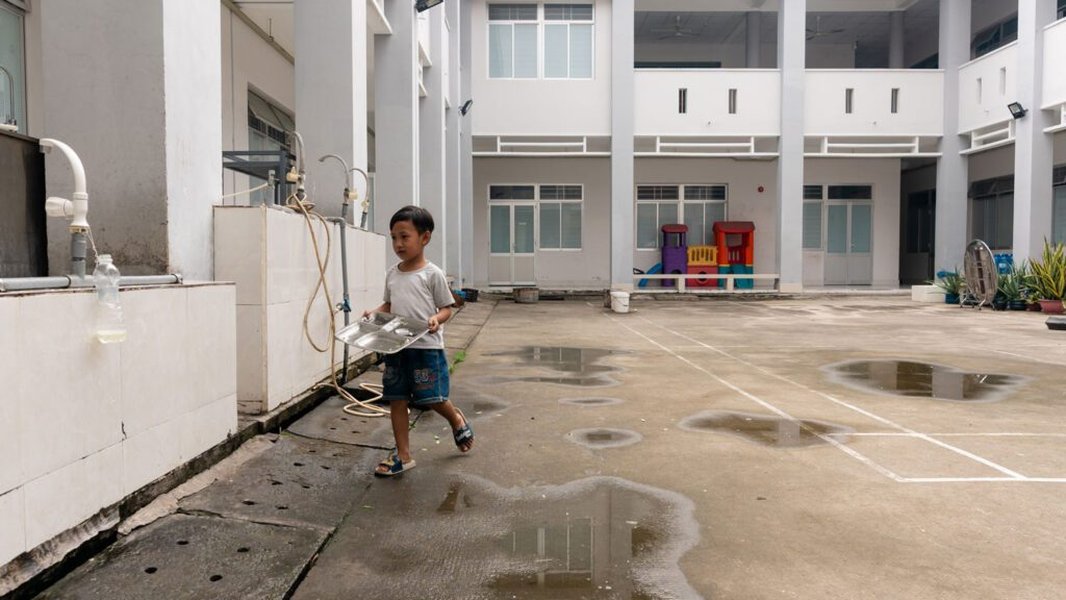 orphanage building children play