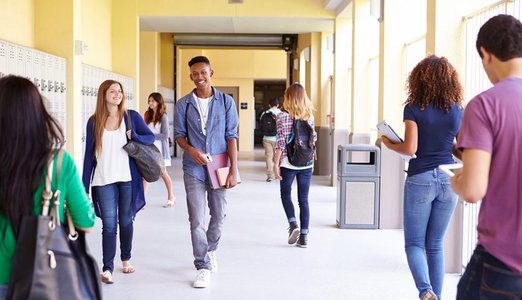 students in high school campus with academic setting
