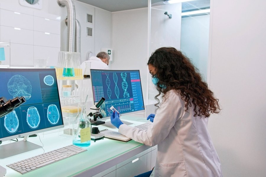 Scientists working in a modern genetics laboratory