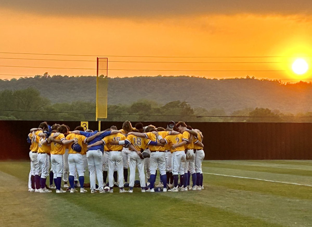 baseball field sunrise team huddle