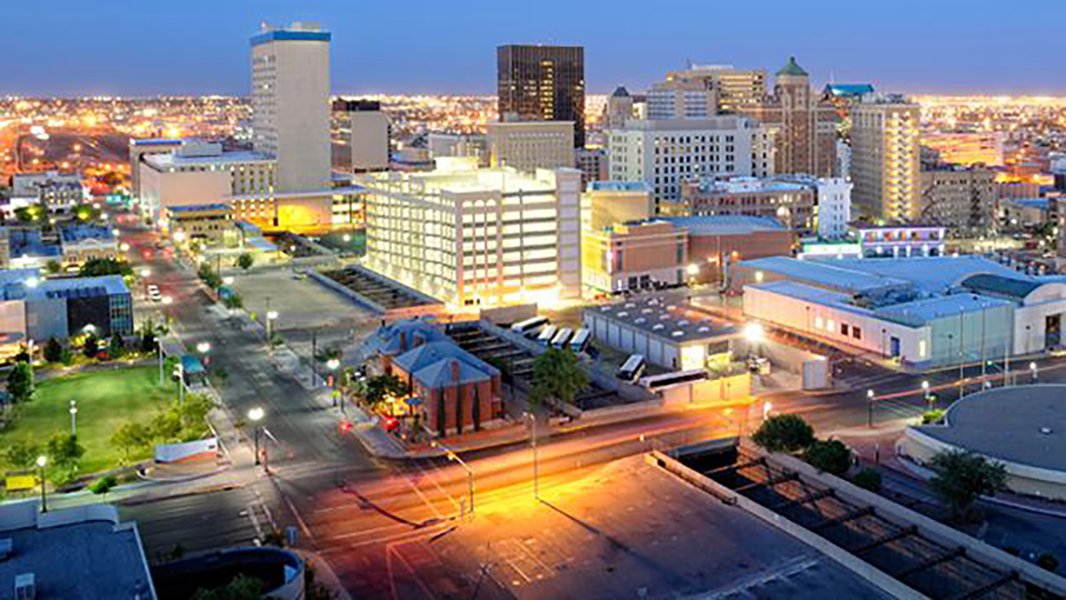 Baytown's waterfront with a cityscape in the background, possibly indicating the ACE District.