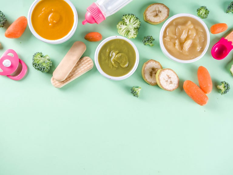 baby food preparation and colorful fresh vegetables