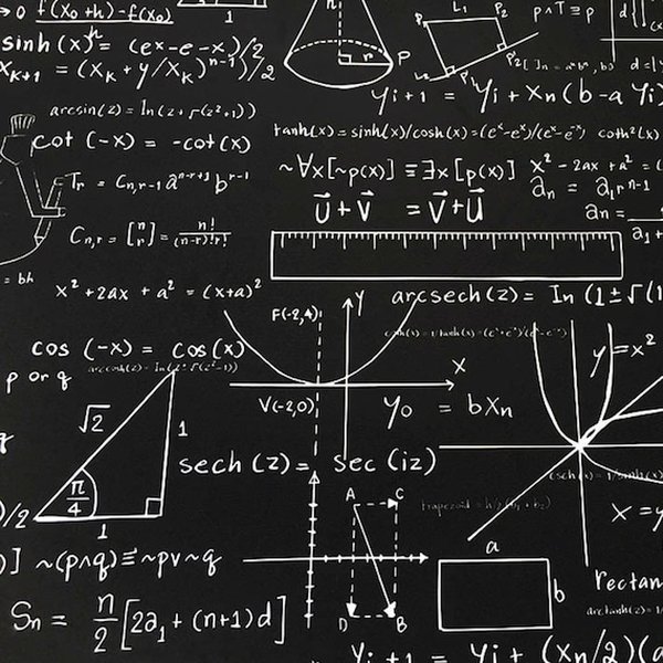 Math formulas and diagrams on a chalkboard