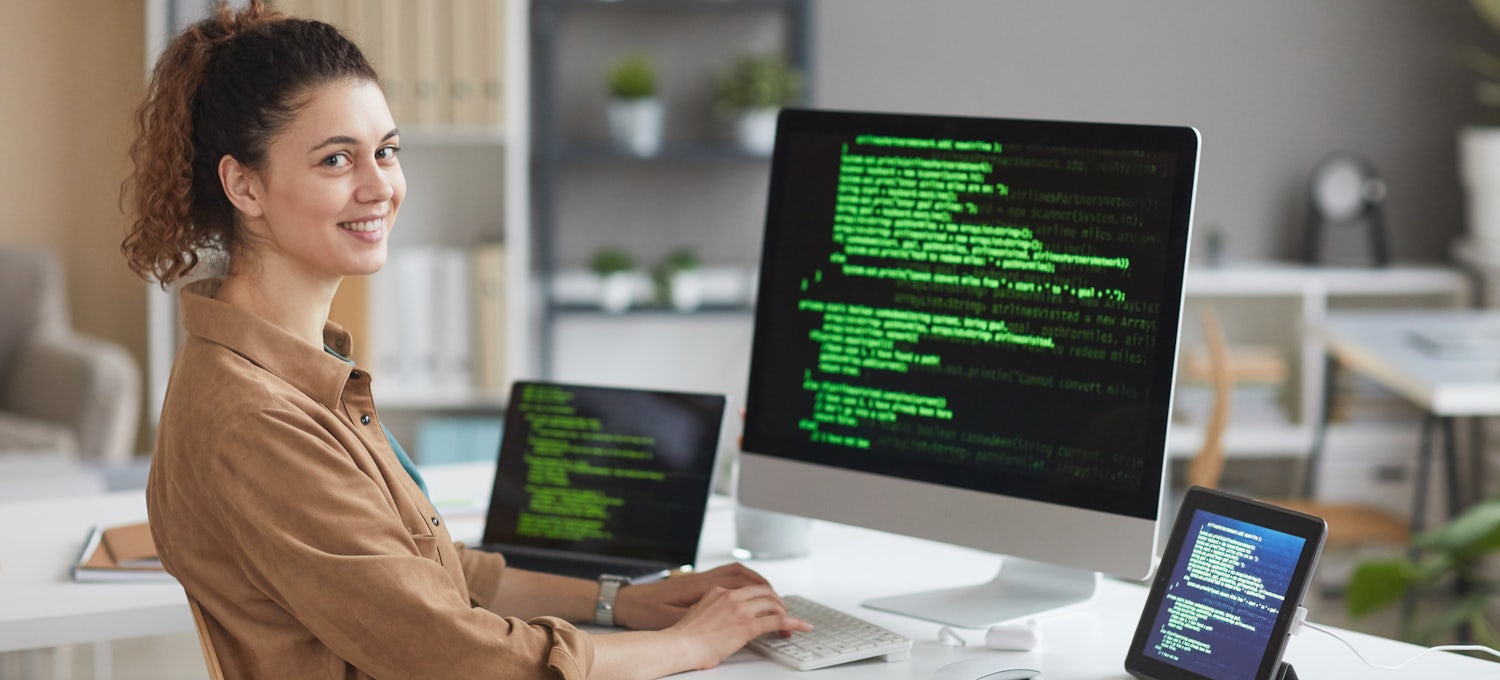 modern developer working on laptop code