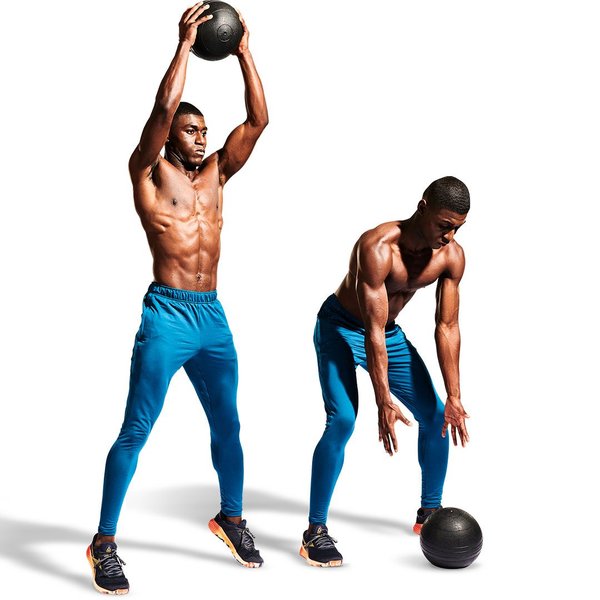 Person performing a medicine ball slam exercise.