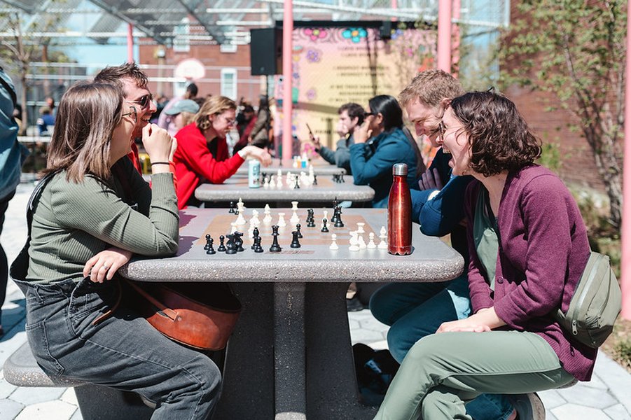 An outdoor chess board in a park