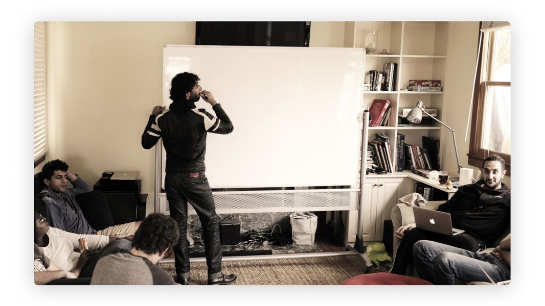 A group of people brainstorming, illustrating a common creativity technique.
