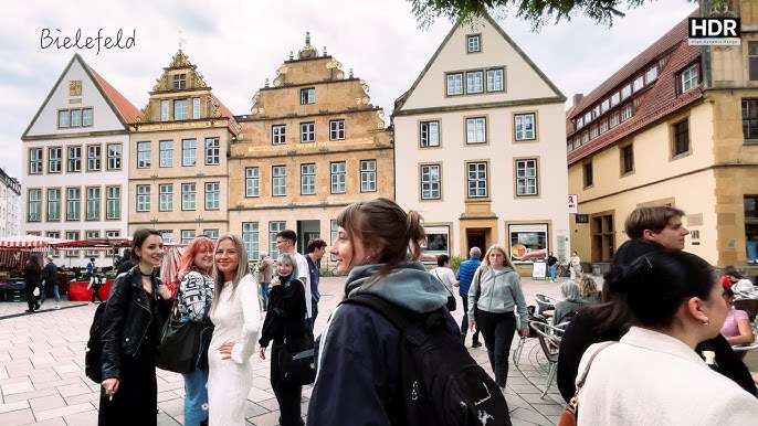 Bielefeld city street scene with groups of people
