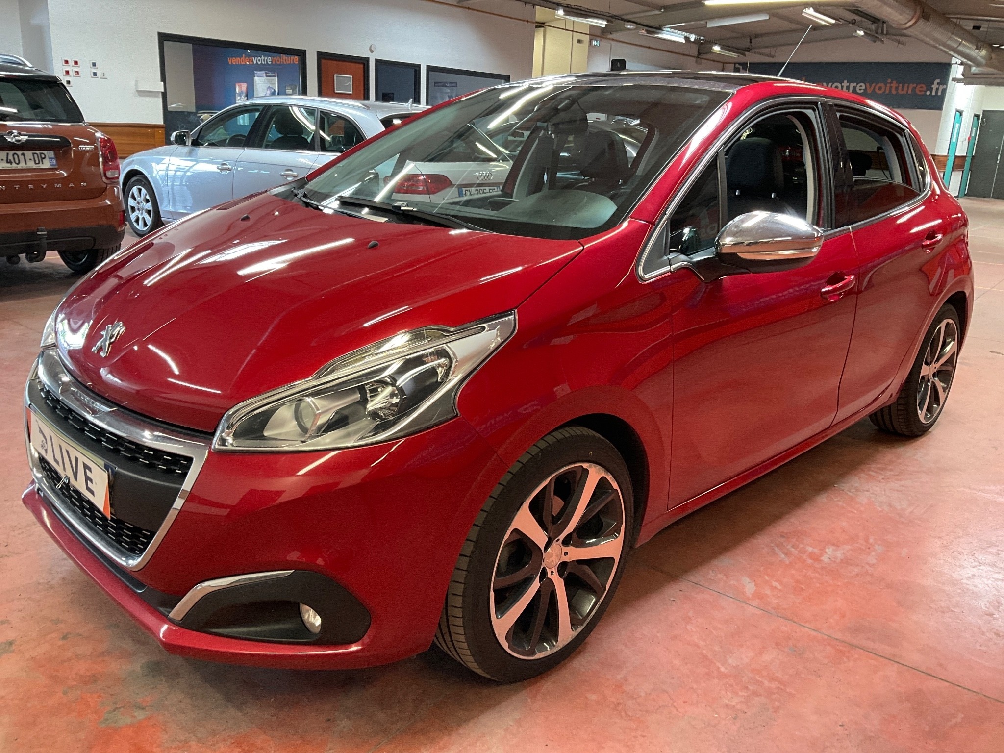 Peugeot 208 showroom and paperwork