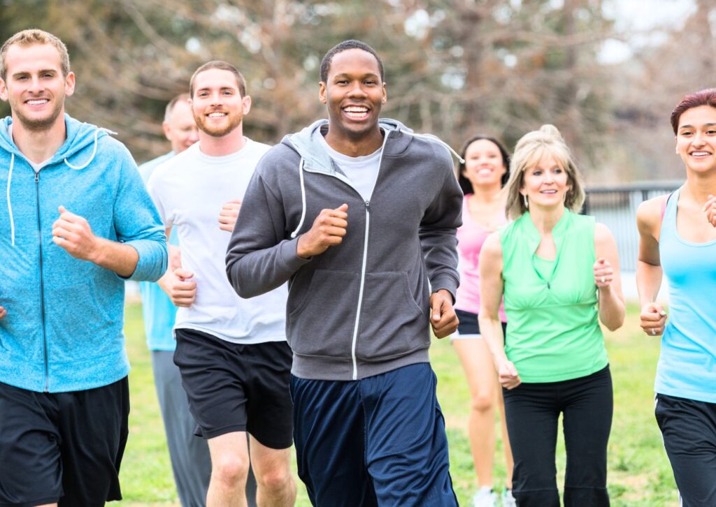 people exercising outdoors, motivational group meeting, reflective journaling session