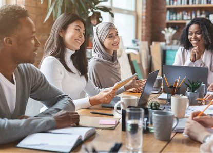 diverse group meeting in professional office