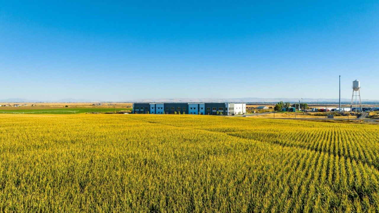 farmland and manufacturing plant