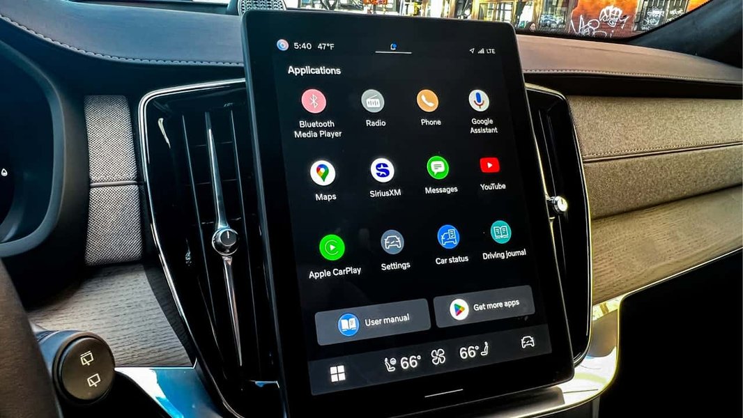 A modern car interior featuring an integrated infotainment system, highlighting the seamless but complex nature of in-car tech.