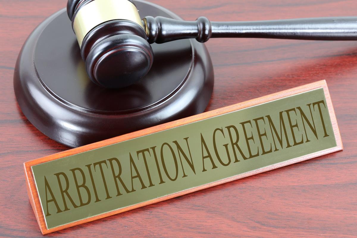 courtroom scales arbitration documents