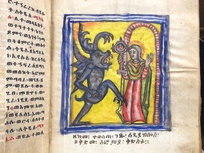 old spanish manuscript with quill and leather