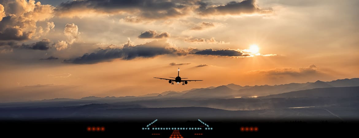 airplane runway sunset