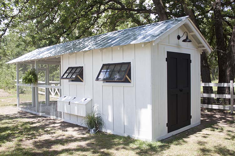 scenic old farm with chicken coops