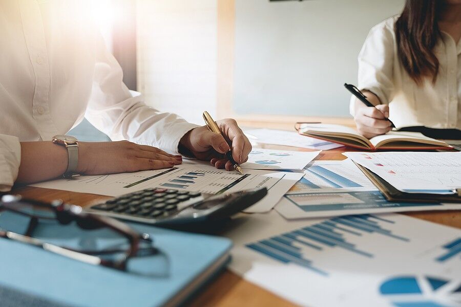 business meeting documents financial charts