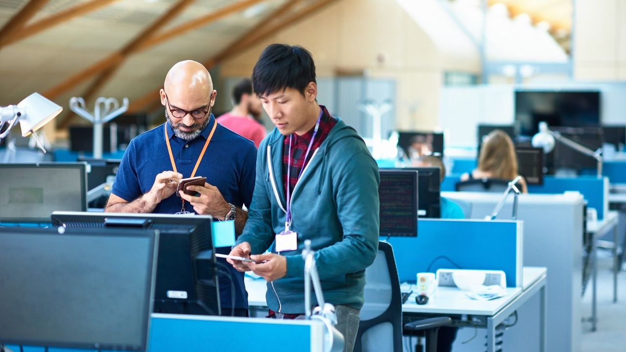 workers in a digital platform office