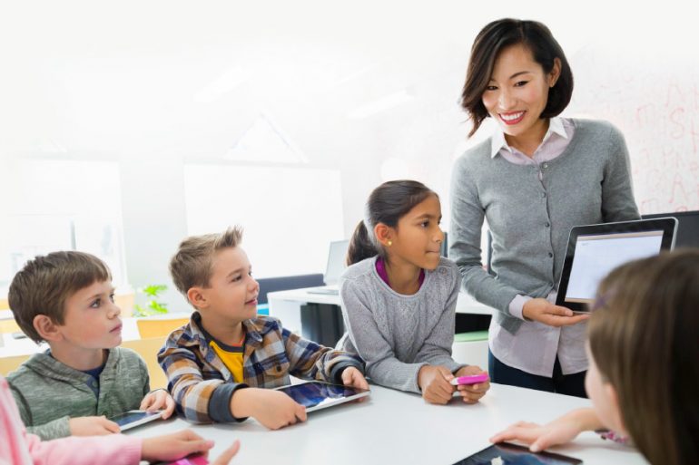 modern classroom with technology and engaged students