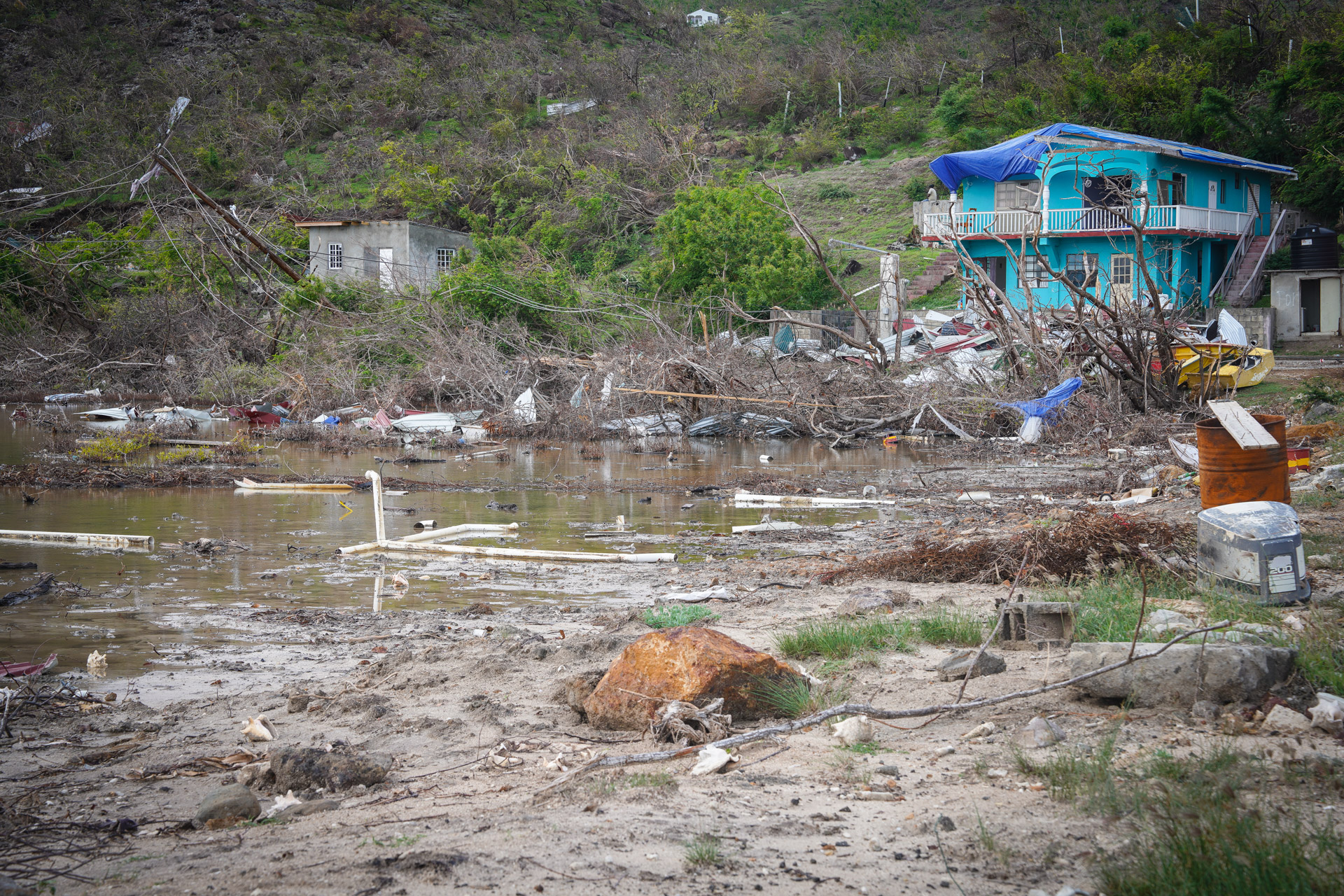 Caribbean island coastline storm destruction