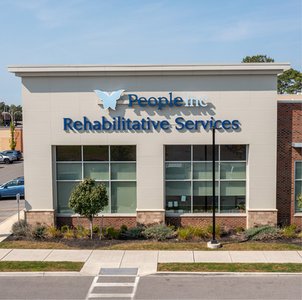 people in therapy building facade