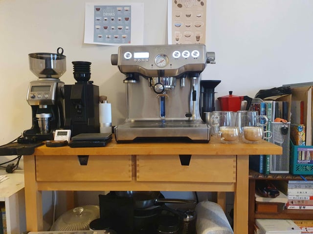 coffee brewing setup with French Press and espresso machine