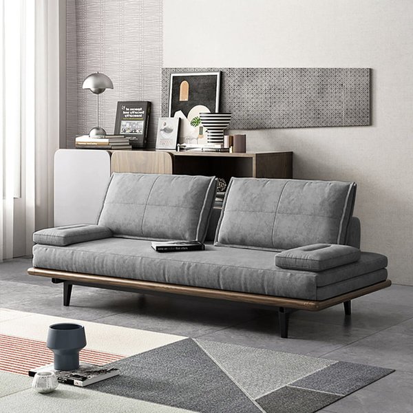 A mid-century modern sleeper sofa with a wood frame and grey cotton-linen upholstery.