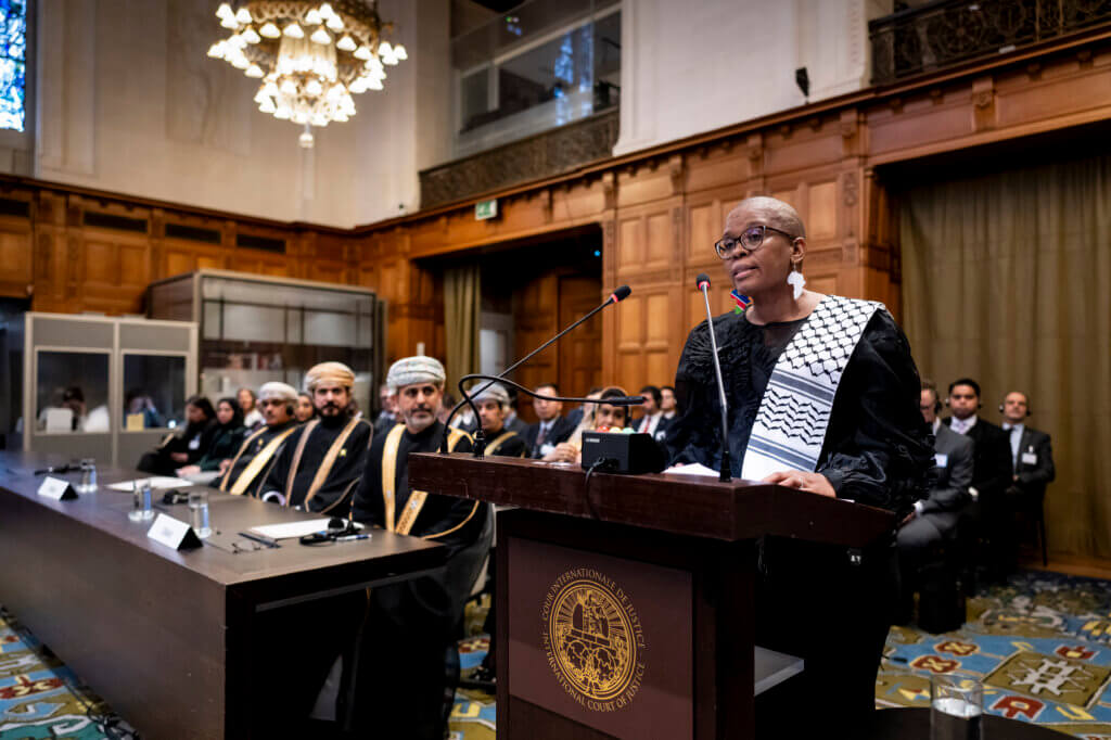 international justice scales and global courtroom