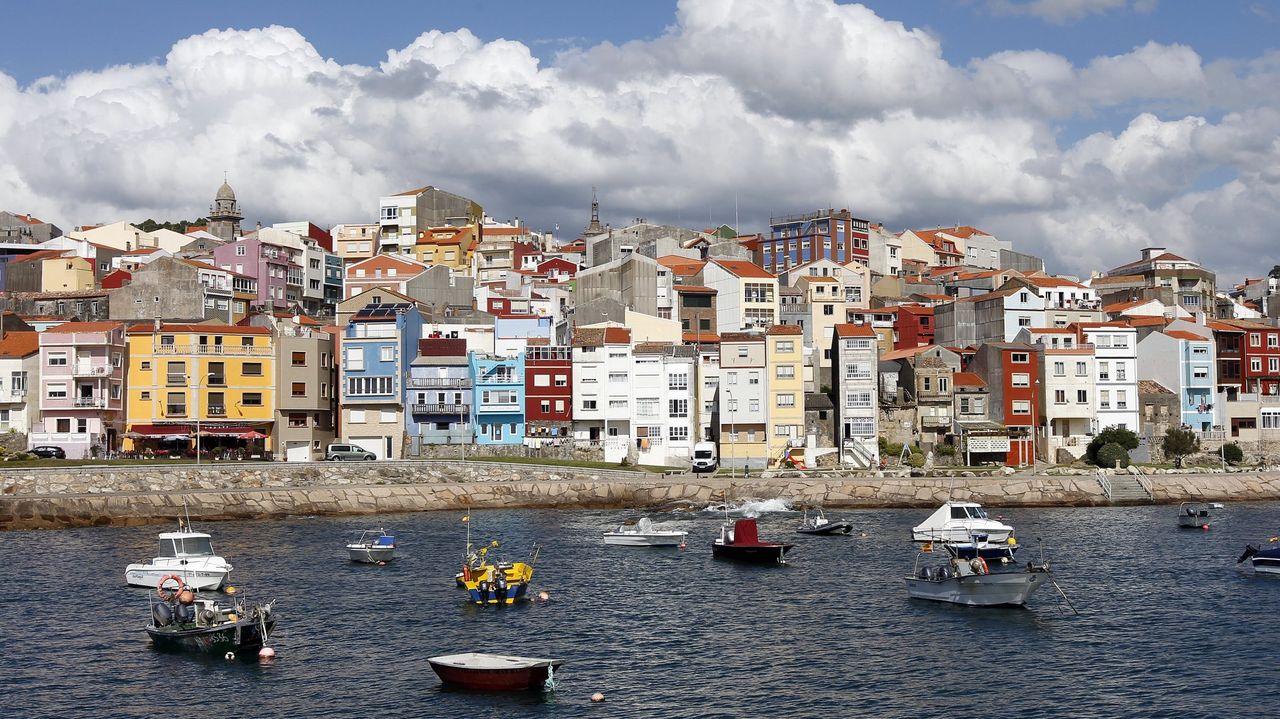 Galician coastal cliffs and fishing village