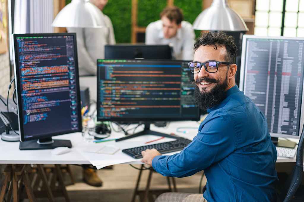 scenic view of computer and coding workspace