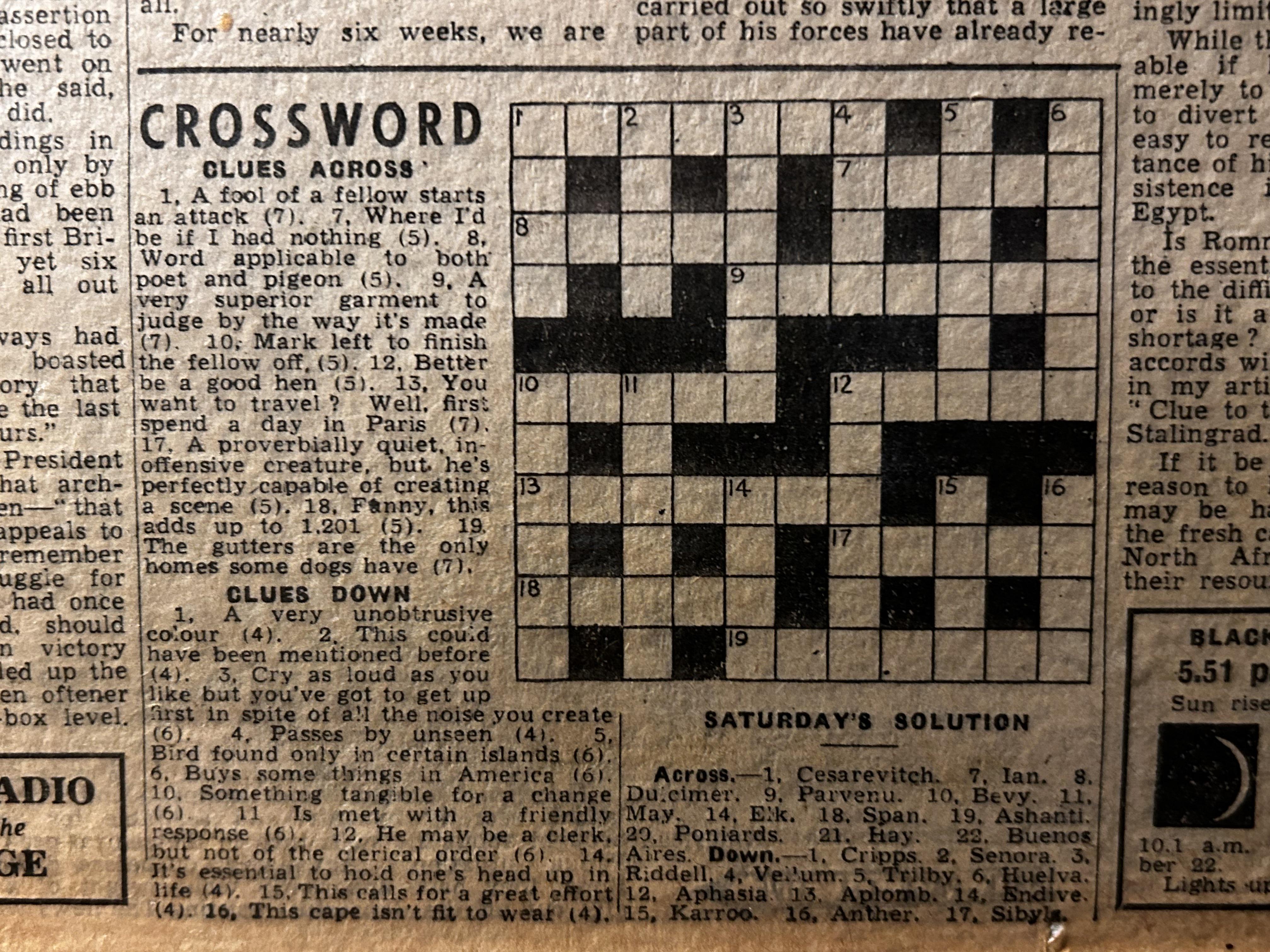 old crossword puzzle newspaper with annotations