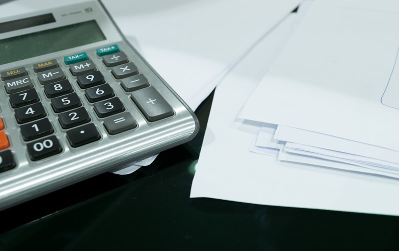 financial planning documents with calculators