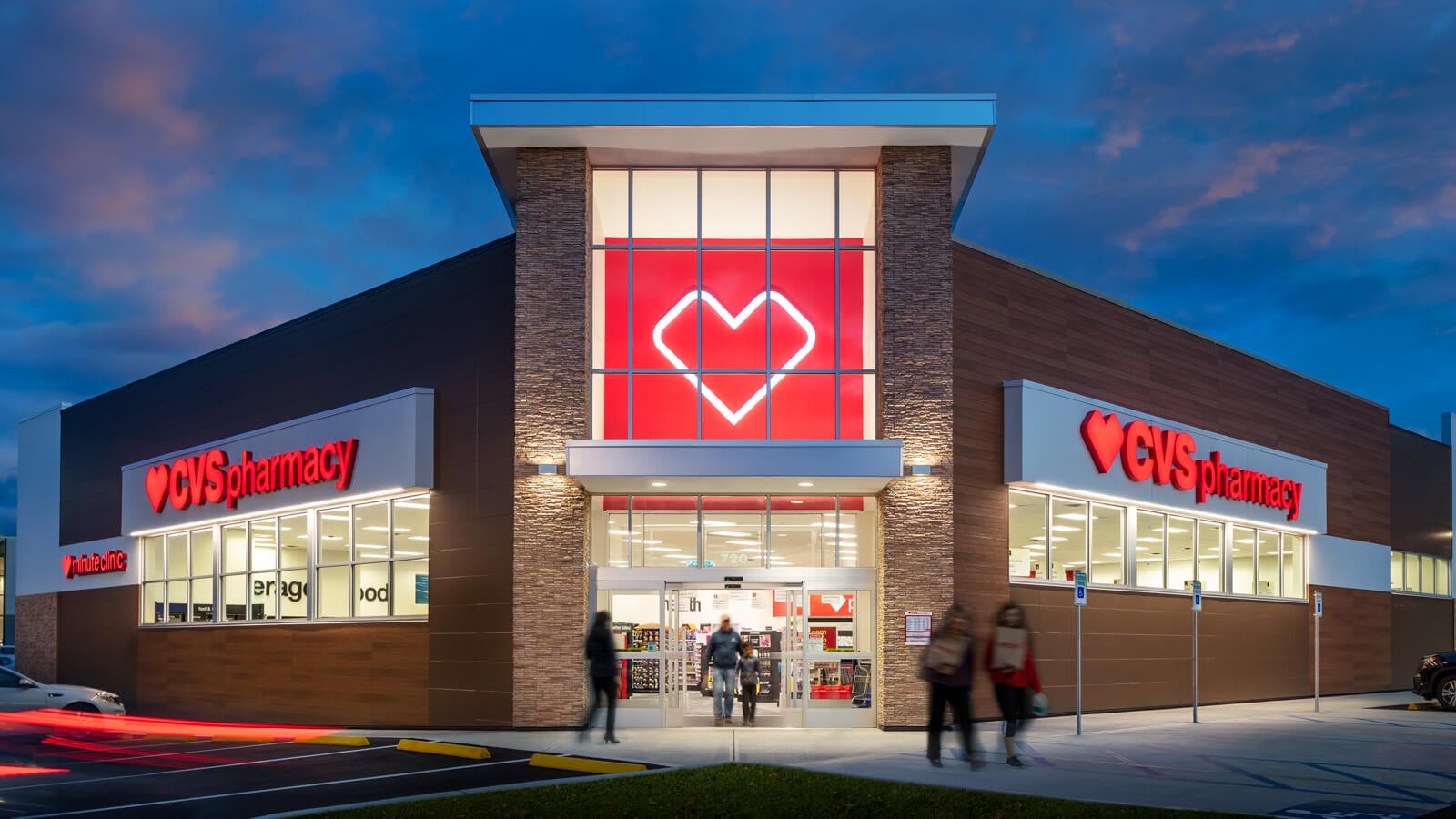 CVS Health corporate building and pharmacy retail store