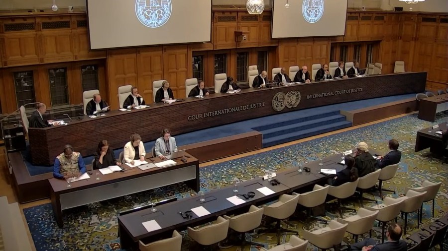 international courtroom and documents on desk