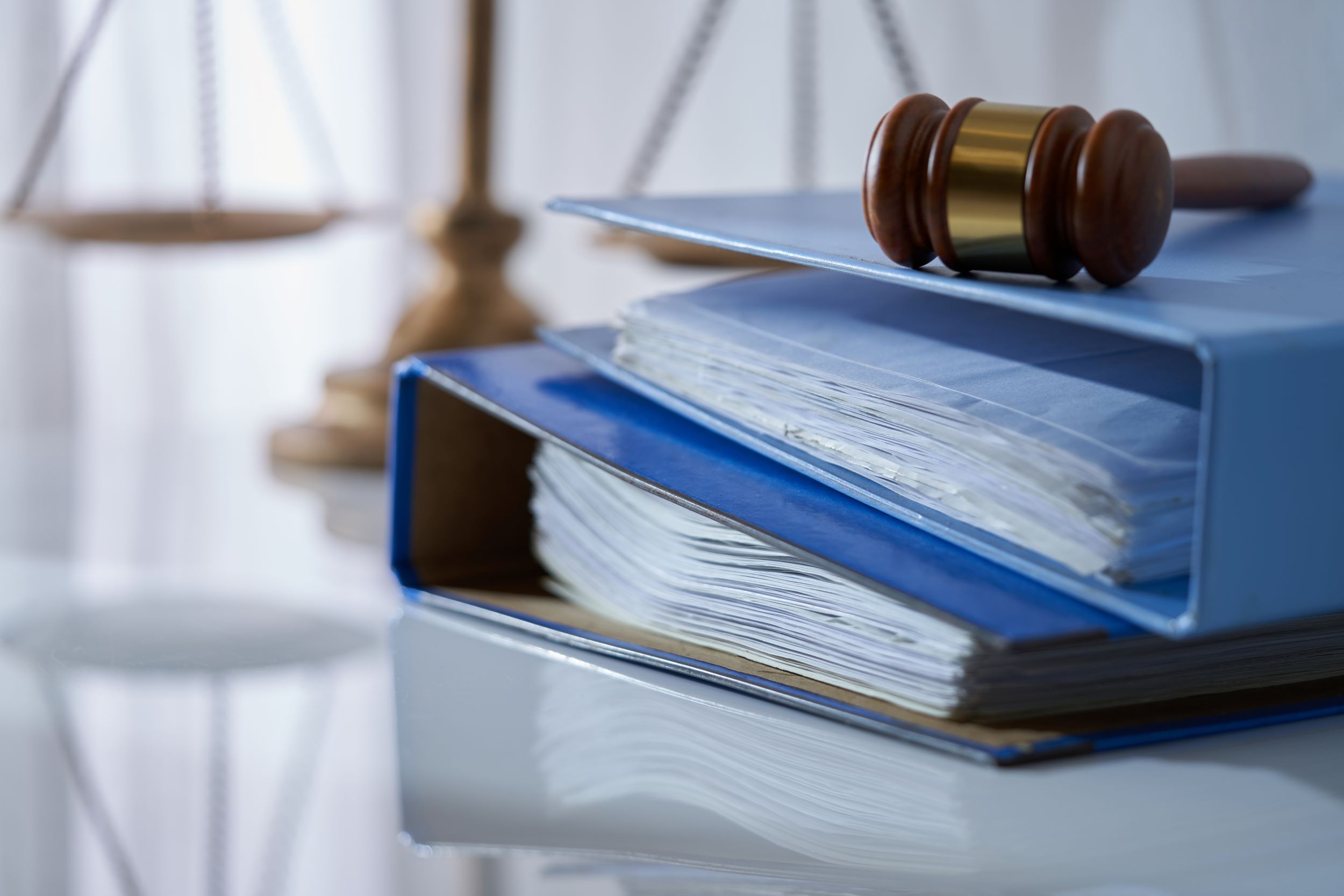 distributorship agreement document, court building, legal analysis books