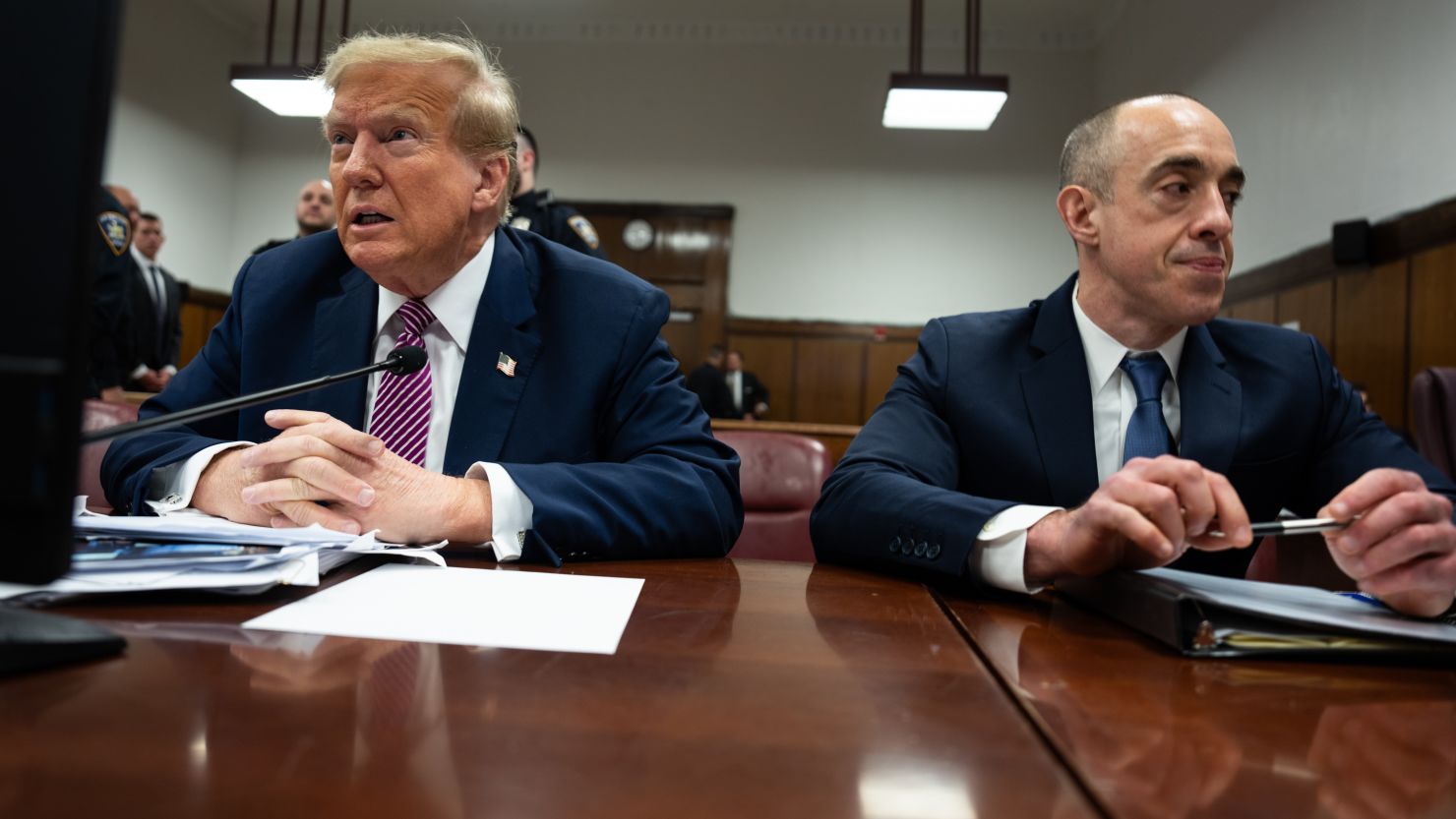 political figures and courtroom scene
