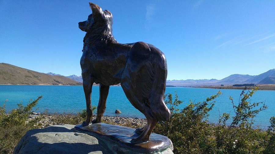 winter landscape with strong dog statue