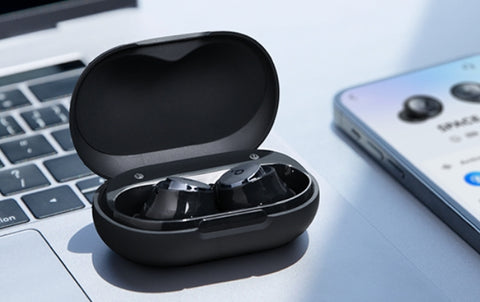 wireless earbuds on charging case