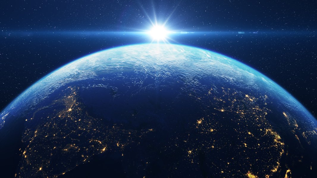 Artistic representation of Earth and the Sun in space.