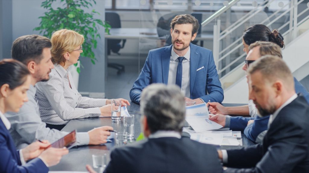 workers negotiating in meeting